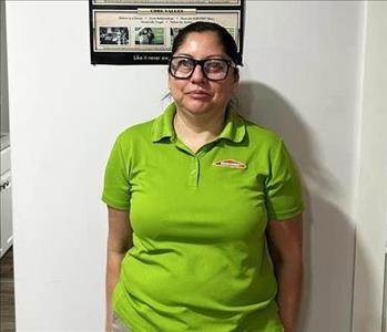 Office Manager posing for Christmas pictures in our waiting room 